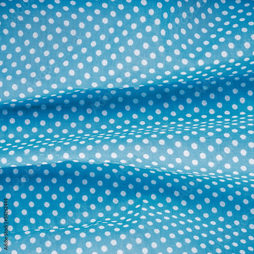 closeup of blue polka dot fabric