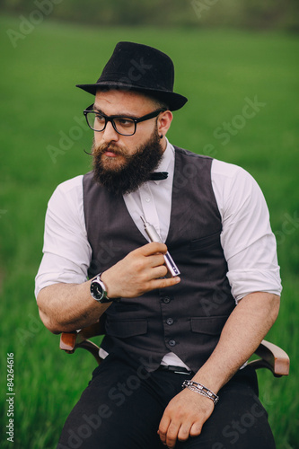 bearded man vaping photo