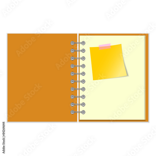 Open notebook with yellow sticker