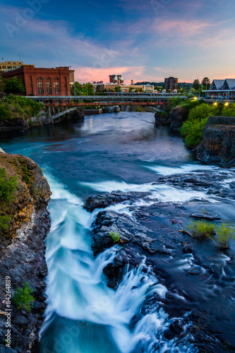 Spokane Falls and view of buildings in Spokane, Washington. © jonbilous