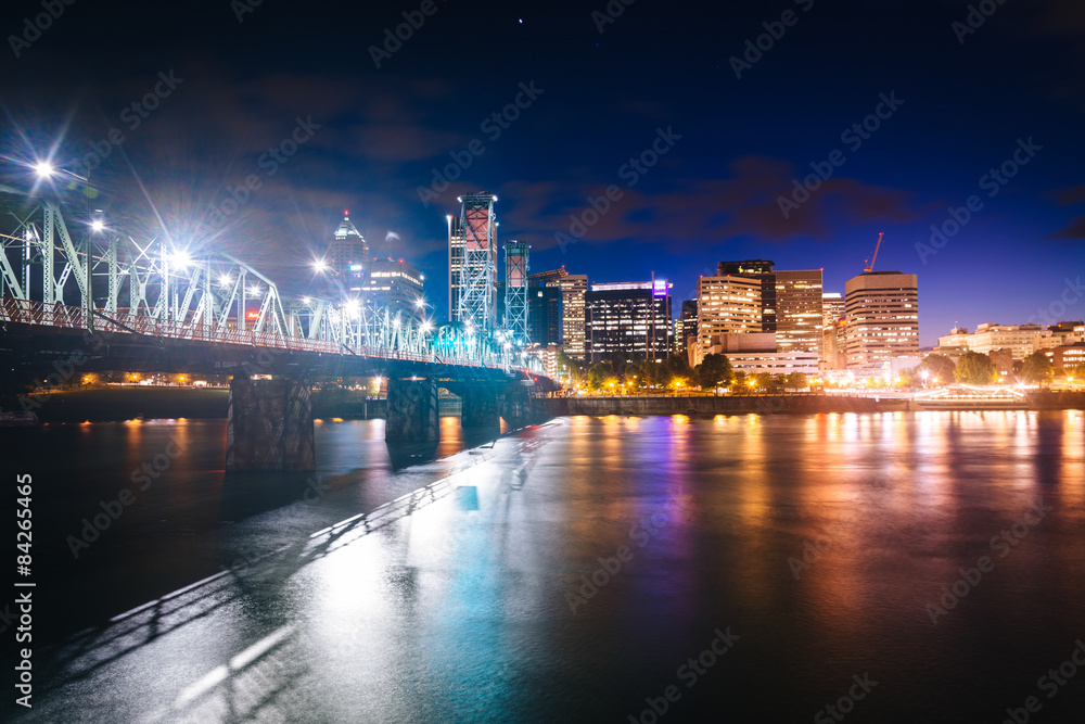 The skyline and Hawthorne Bridge over the Williamette River at n