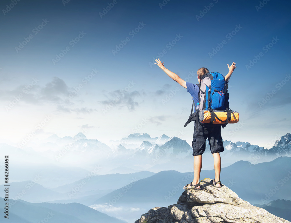 Tourist on mountain peak. Sport and active life concept Tourist on mountain peak. Sport and active life concept