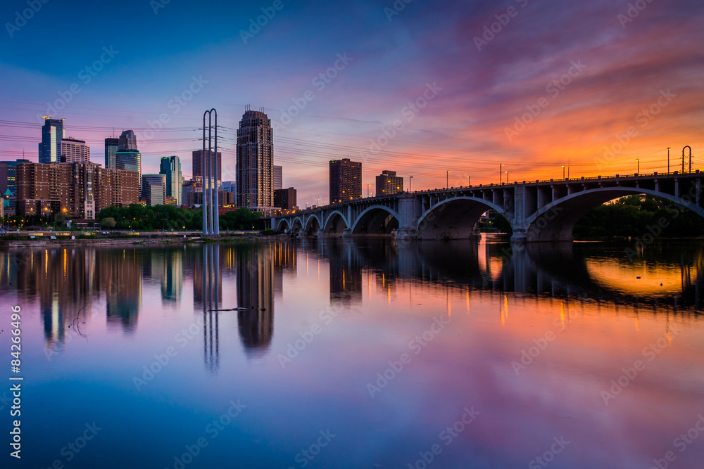 Sunset over the Minneapolis skyline and Mississippi River, in Mi