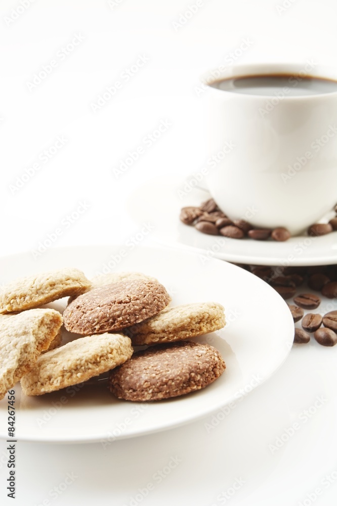 Cup of coffee with cookies and saucer on white Cup of coffee with cookies and saucer on white