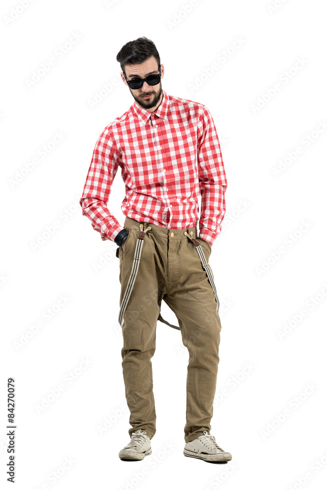 Bearded hipster with questioning look above sunglasses Bearded hipster with questioning look above sunglasses