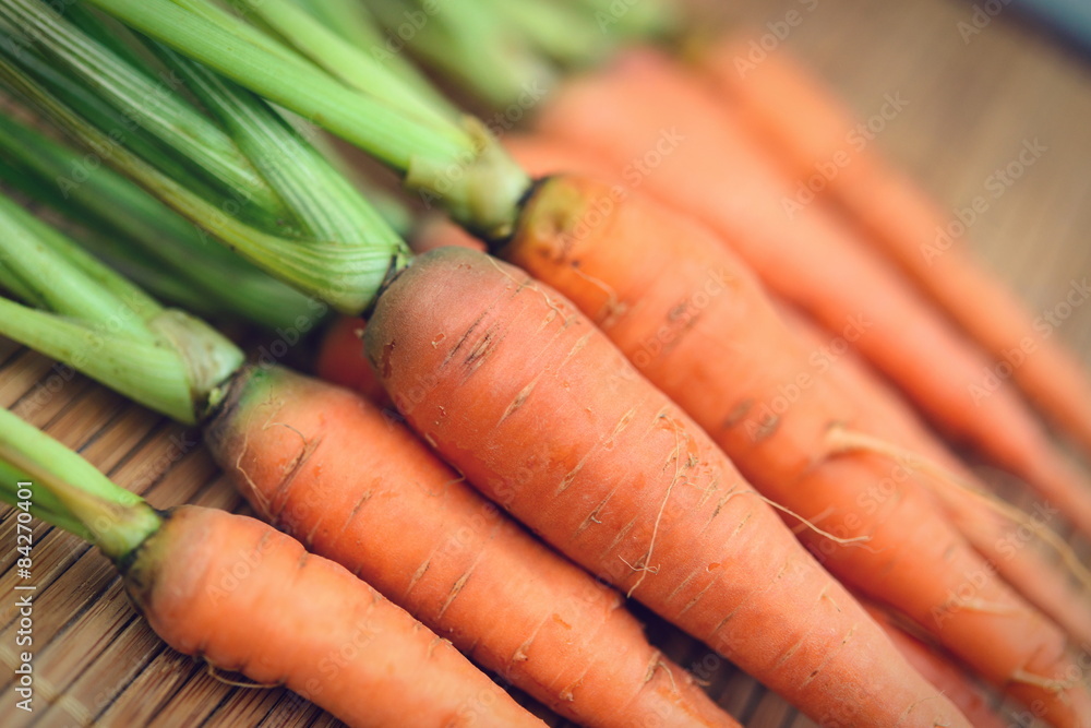Baby carrots, fresh vegetables grown with pesticides and non-tox Baby carrots, fresh vegetables grown with pesticides and non-tox
