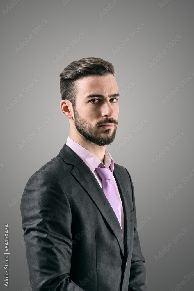 Portrait of mysterious young bearded man in formal wear Portrait of mysterious young bearded man in formal wear