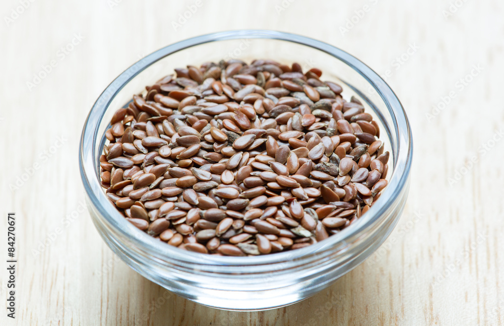 Flax seeds in the glass bowl Flax seeds in the glass bowl