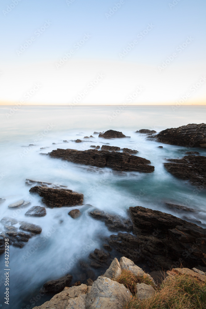 Sunrise on the coast of the Bay of Biscay in Muskiz, Spain