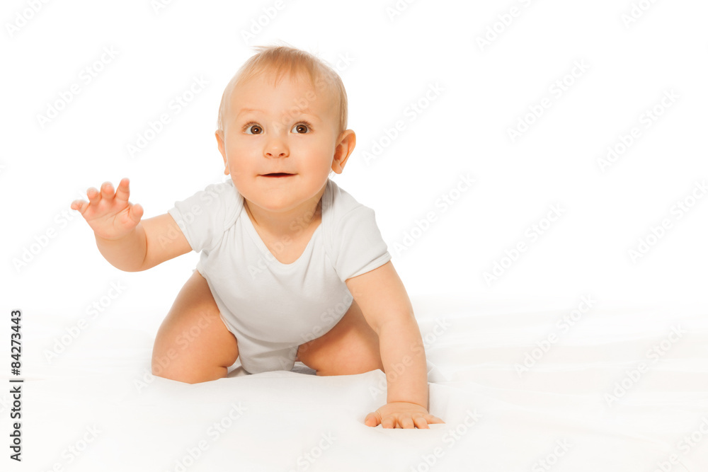 Close-up view of happy baby wearing white bodysuit Close-up view of happy baby wearing white bodysuit