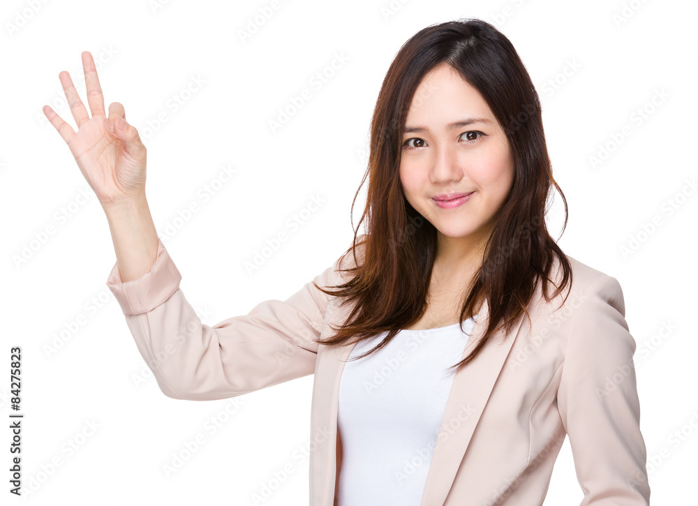 Young businesswoman with ok sign gesture Young businesswoman with ok sign gesture