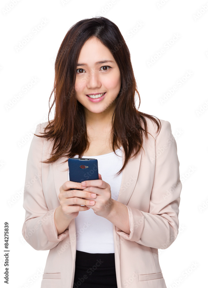 Asian businesswoman read the message on smart phone Asian businesswoman read the message on smart phone