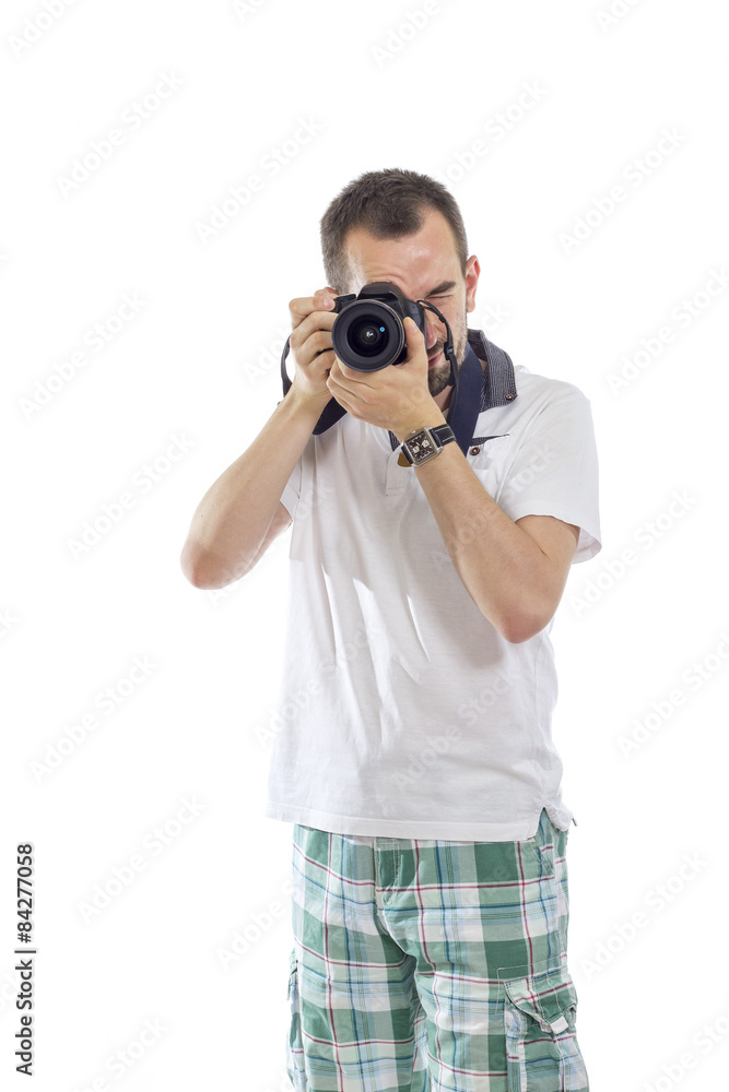Young photographer isolated on white