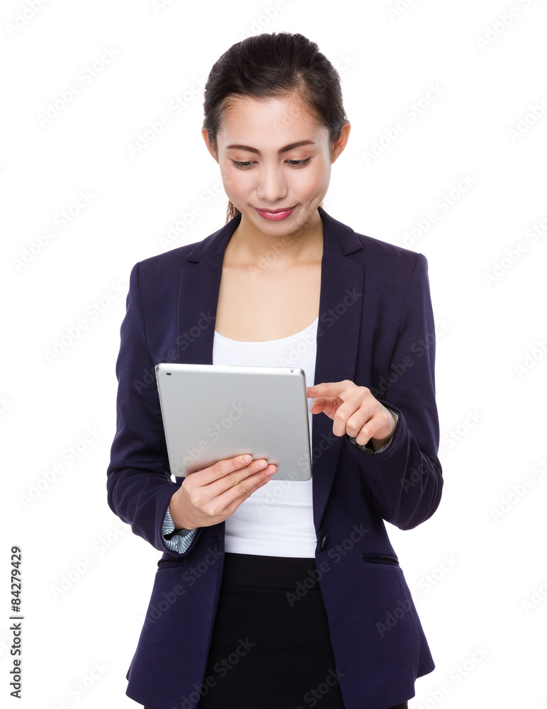Young businesswoman use of tablet pc Young businesswoman use of tablet pc