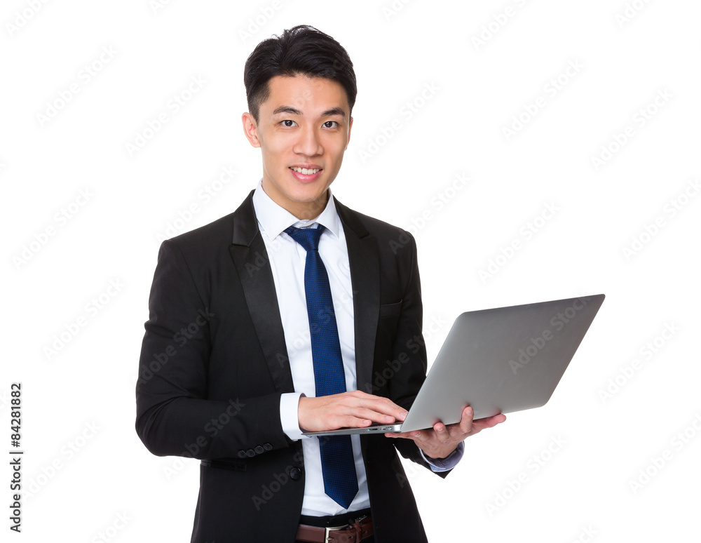 Asian businessman use of laptop computer