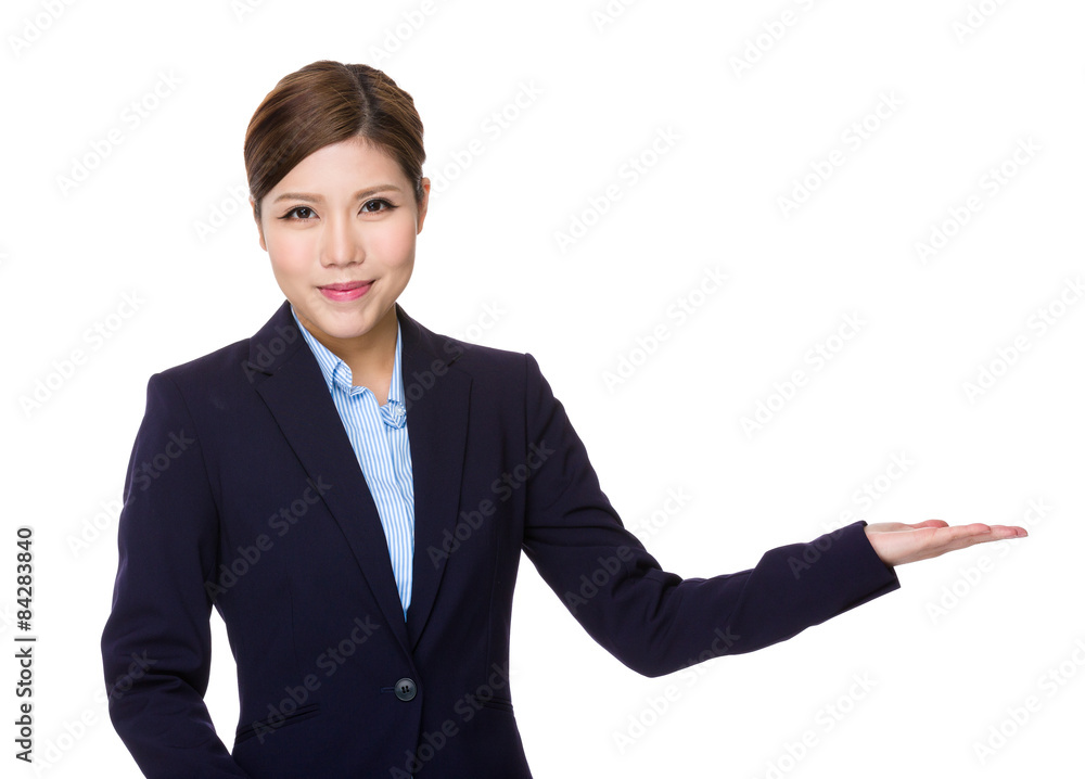 Young businesswoman with hand presentation Young businesswoman with hand presentation