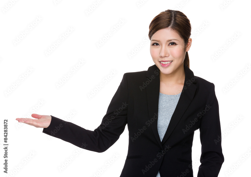 Young businesswoman with open had palm Young businesswoman with open had palm