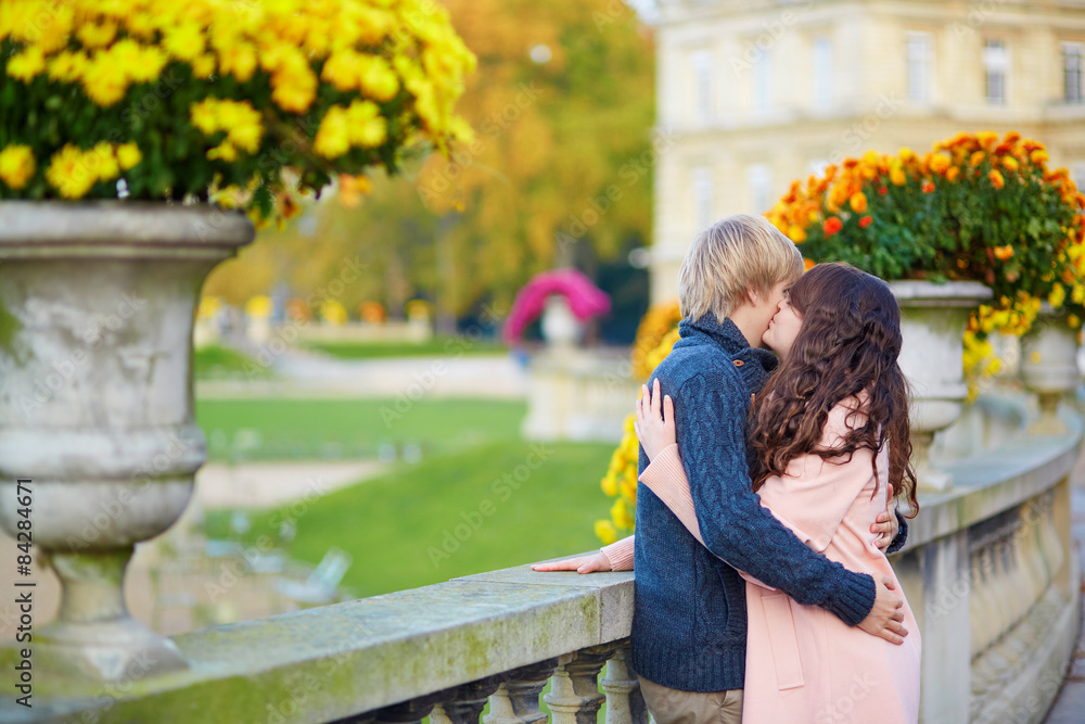 Young dating couple in Paris on a fall day Young dating couple in Paris on a fall day