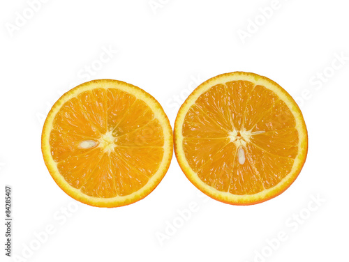 Two orange fruit segments or cantles isolated on white backgroun