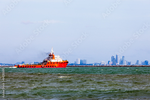 red tugboats on the sea
