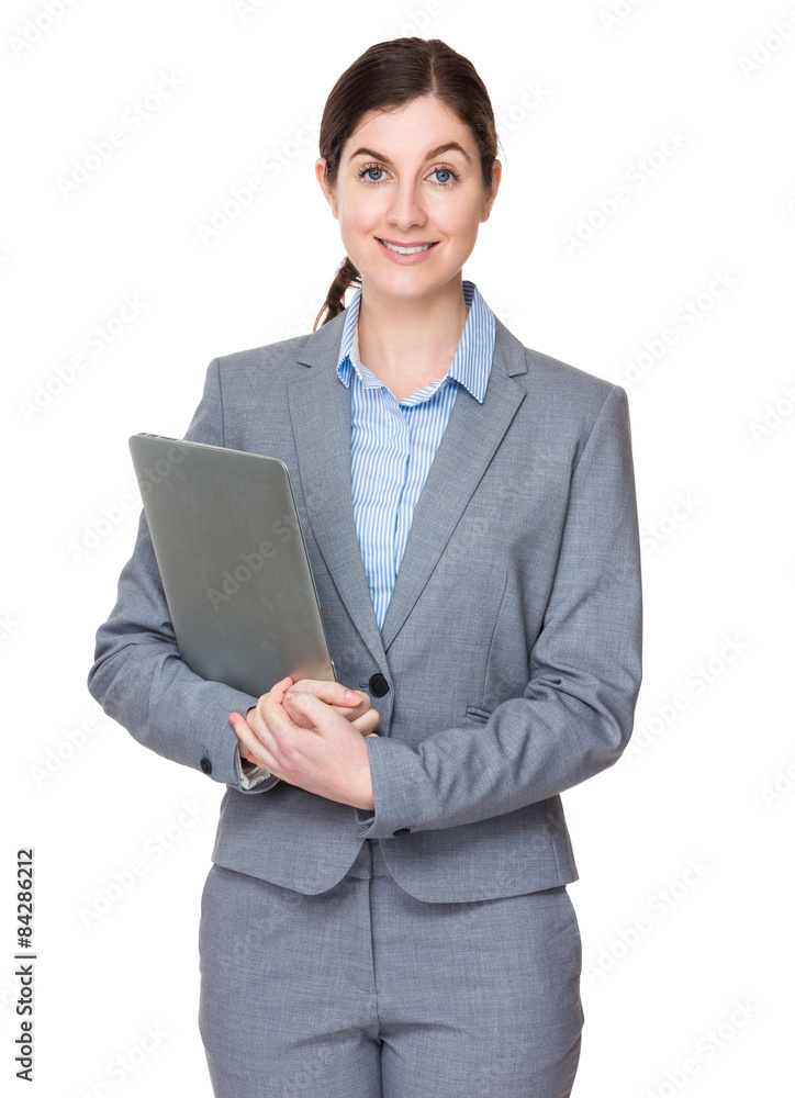 Brunette businesswoman holding with laptop computer Brunette businesswoman holding with laptop computer