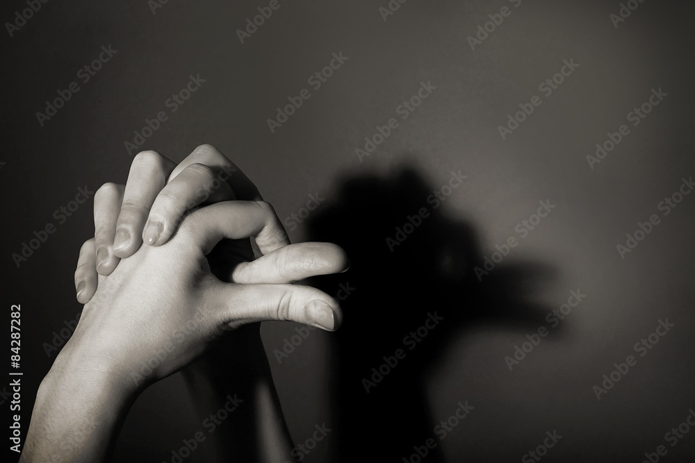 Hands gesture like turkey on gray background Hands gesture like turkey on gray background