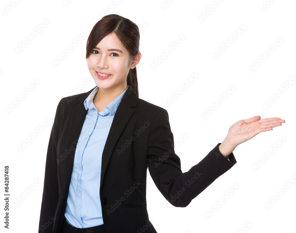 Asian businesswoman with hand showing soemthing Asian businesswoman with hand showing soemthing