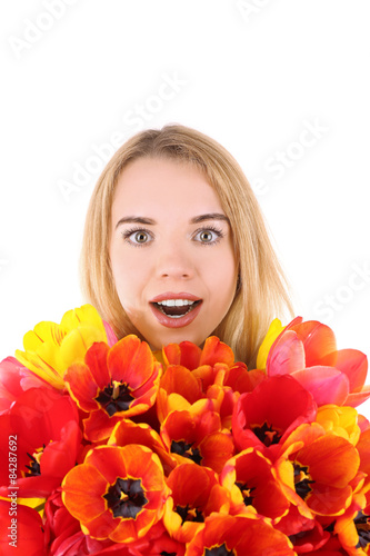 Portrait of young woman with beautiful bouquet of tulips isolated on white
