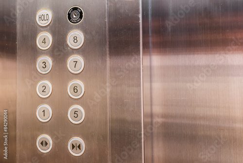 Obraz na płótnie Stainless steel elevator panel push buttons.