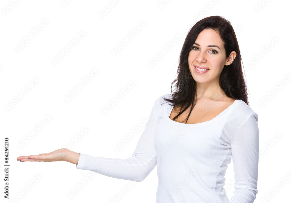 Brunette woman with hand show with blank sign Brunette woman with hand show with blank sign