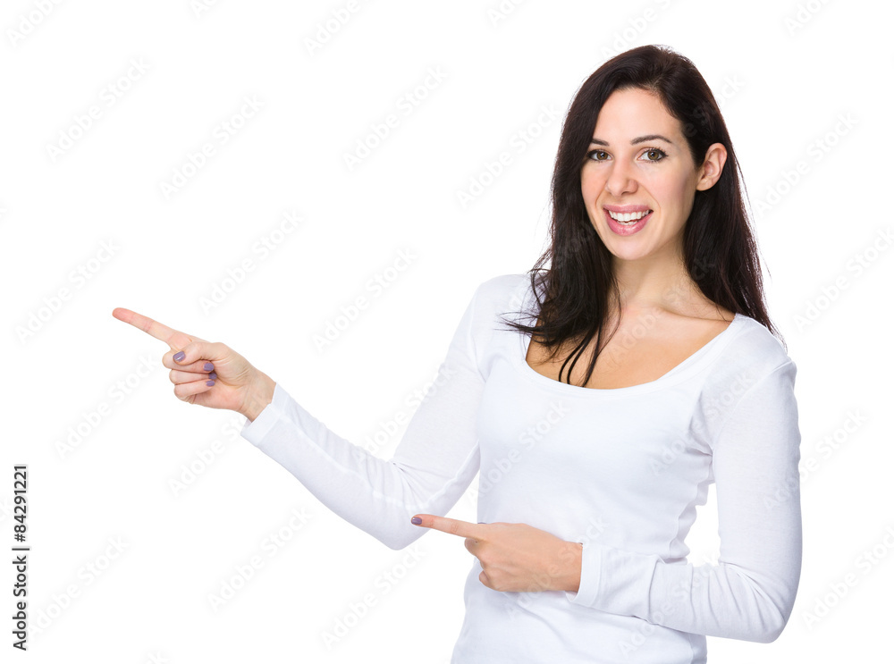 Beautiful woman with two finger pointing aside Beautiful woman with two finger pointing aside