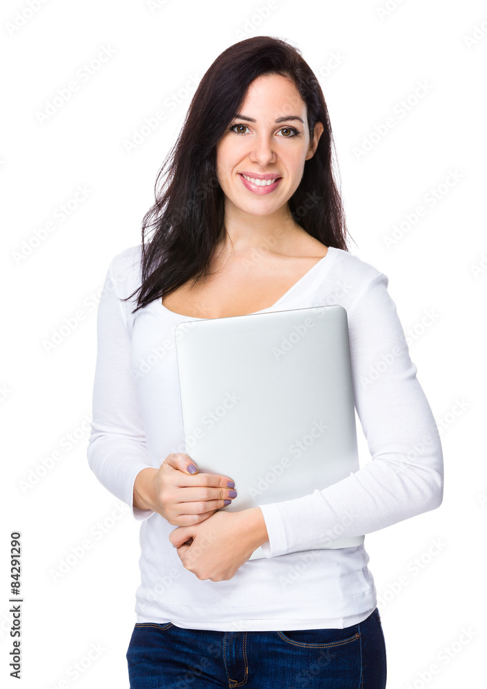 Brunette woman holding with laptop computer Brunette woman holding with laptop computer