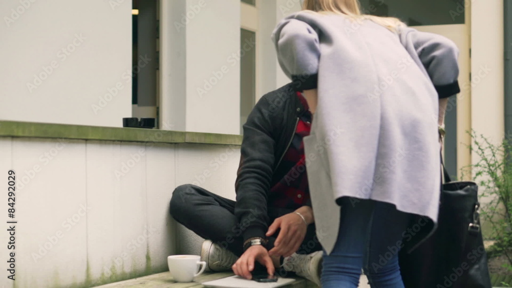 Girl kissing her boyfriend and saying goodbye
Girl kissing her boyfriend and saying goodbye