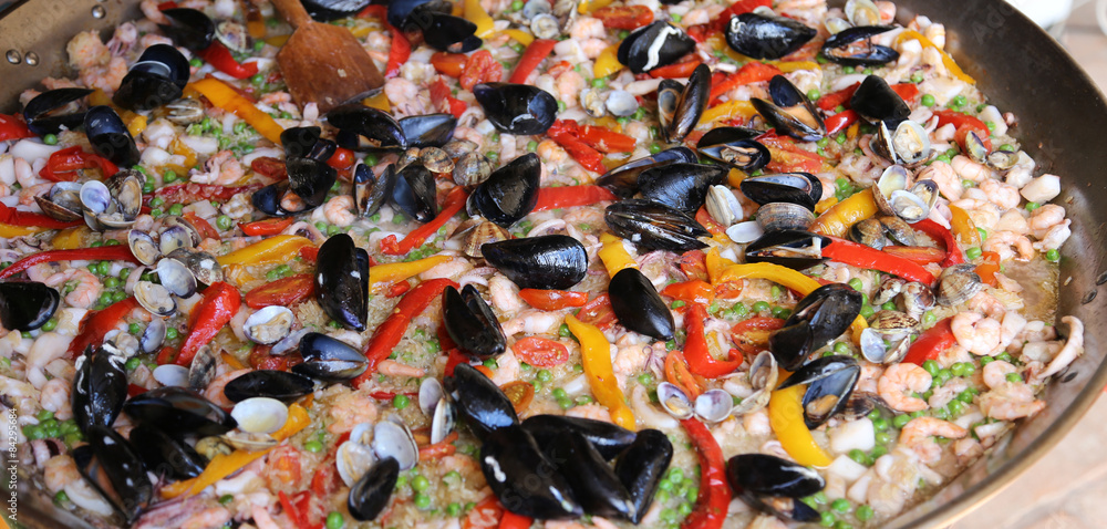 Valencian Paella rice with clams and mussels