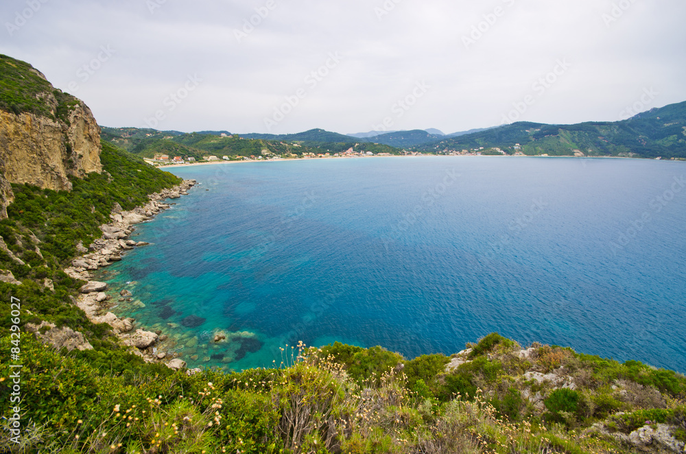 Lagoon and high cliffs near Agios Georgios, Corfu, Greece