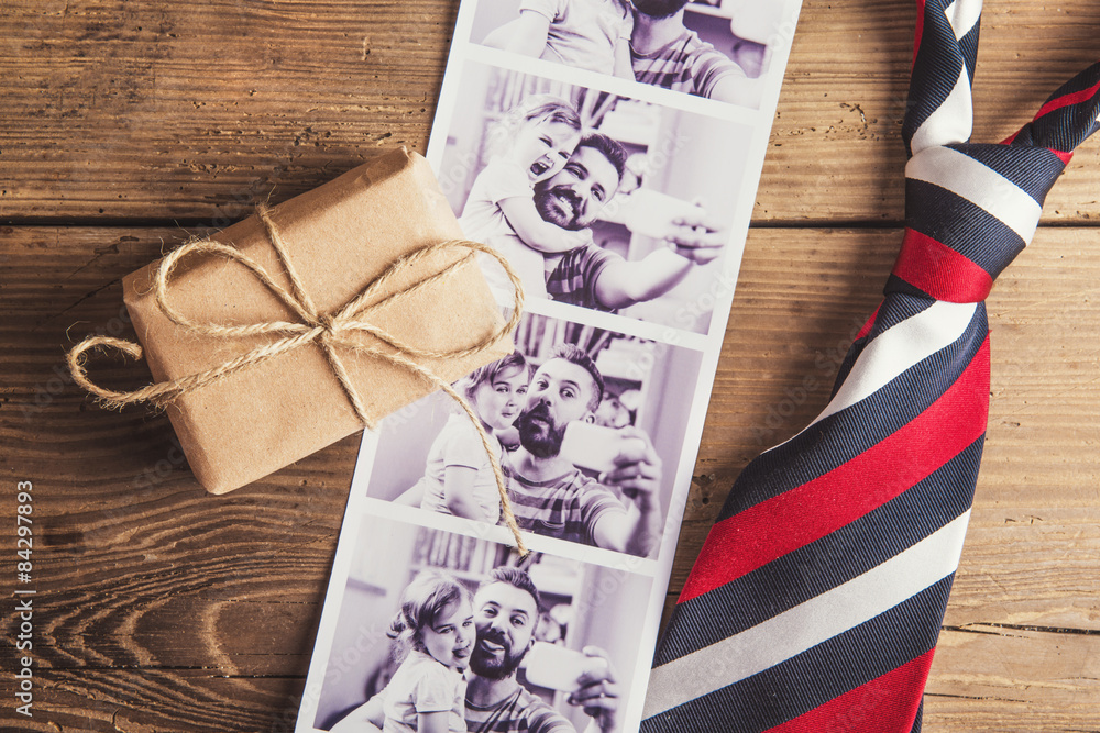 Obraz premium Fathers day composition. Studio shot on wooden background.