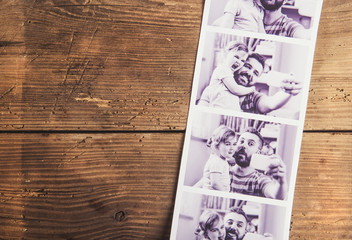 Fathers day composition. Studio shot on wooden background.