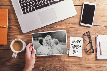 Fathers day composition - wooden office desk. Studio shot.