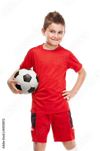 standing young soccer player holding football © _italo_