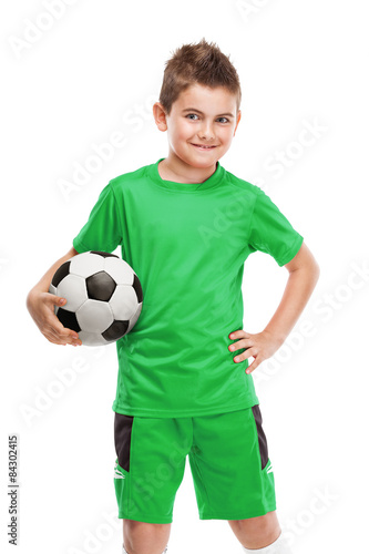 standing young soccer player holding football © _italo_
