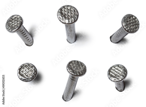 set of metal nail head isolated on white background photo
