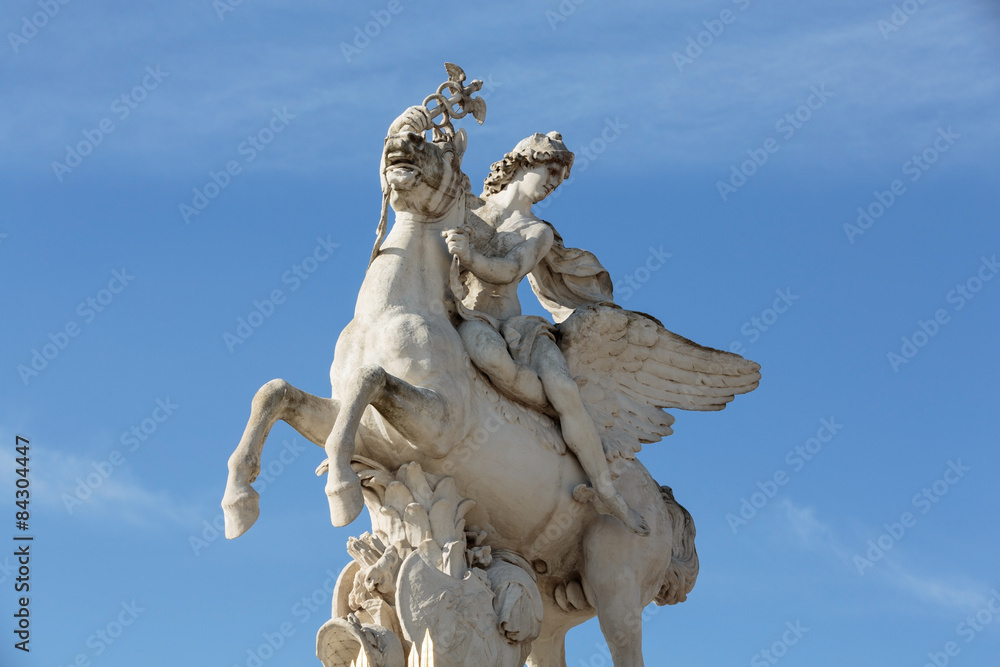 Antique sculpture in Jardin des Tuileries (Tuileries garden) - favorite spot for rest of tourists and Parisians. Garden was created by Catherine de Medici in 1564. Paris, Franc Antique sculpture in Jardin des Tuileries (Tuileries garden) - favorite spot for rest of tourists and Parisians. Garden was created by Catherine de Medici in 1564. Paris, Franc