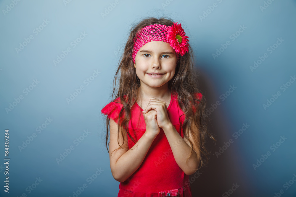 a girl of seven European appearance brunette in a bright dress f a girl of seven European appearance brunette in a bright dress f