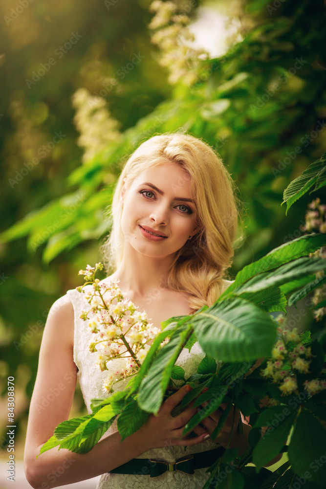Beautiful young woman in spring garden Beautiful young woman in spring garden