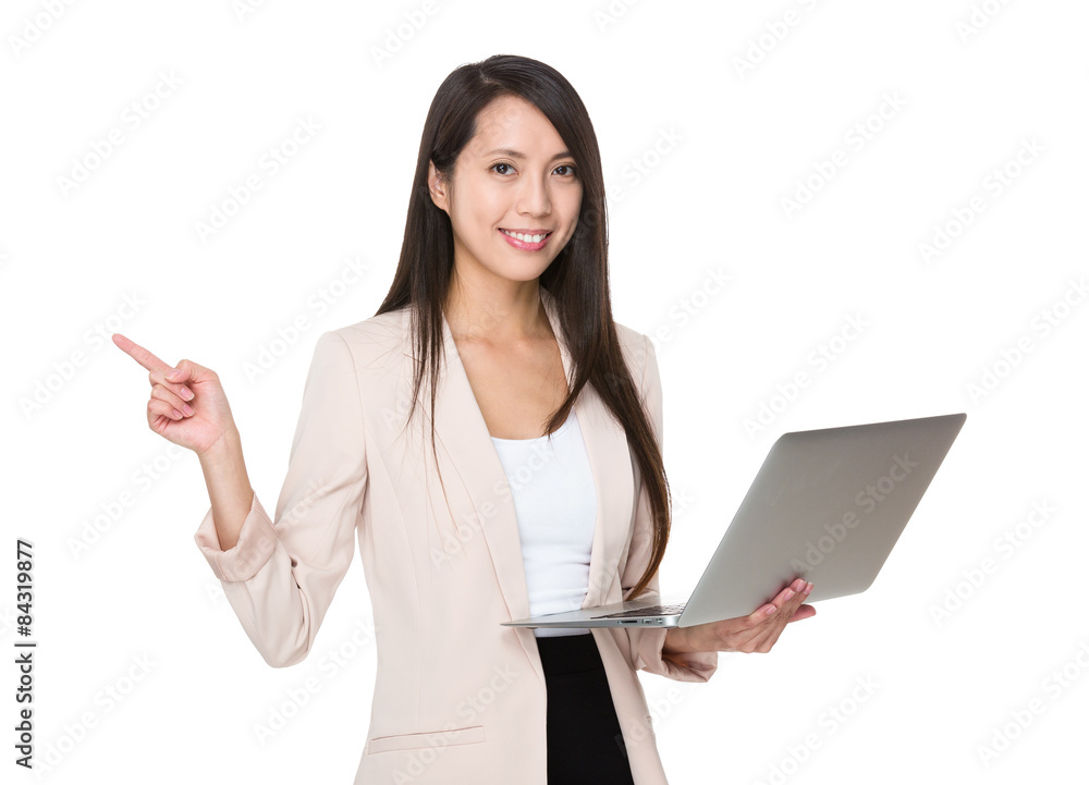 Businesswoman hold with laptop computer and finger point up Businesswoman hold with laptop computer and finger point up