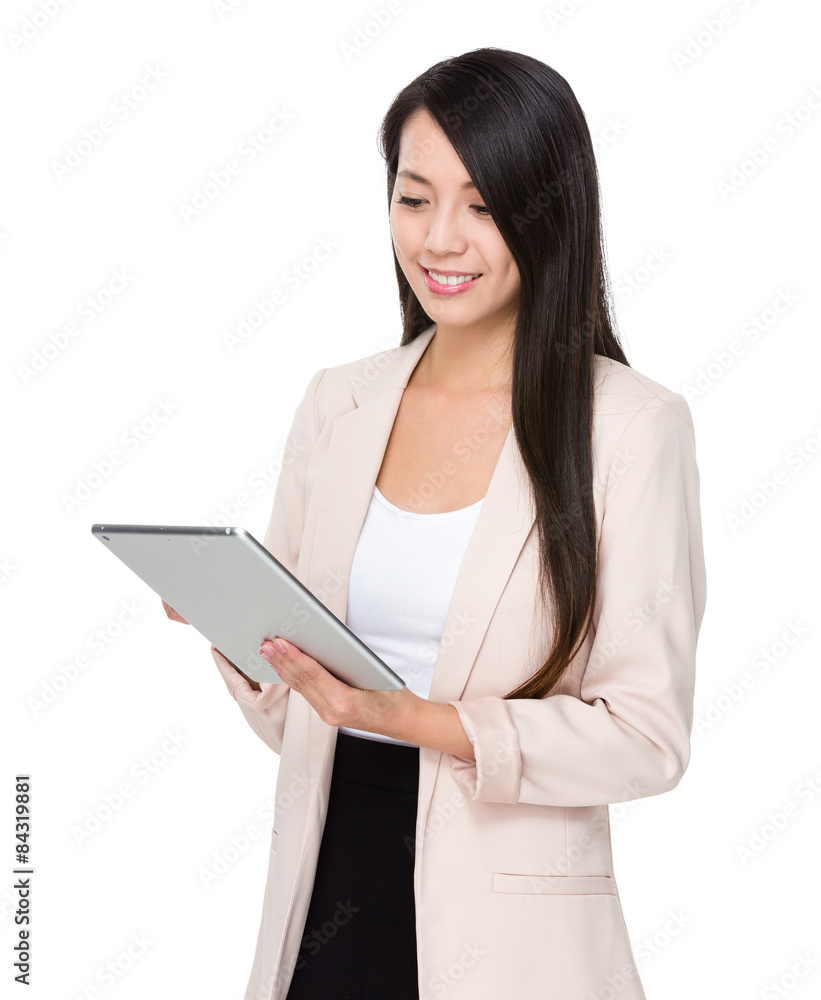 Asian businesswoman use of digital tablet Asian businesswoman use of digital tablet