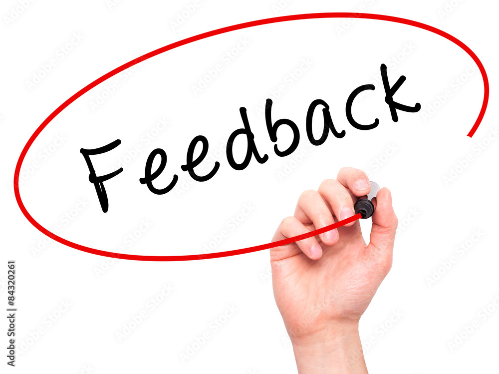 Man Hand writing Feedback with marker on transparent wipe board Man Hand writing Feedback with marker on transparent wipe board