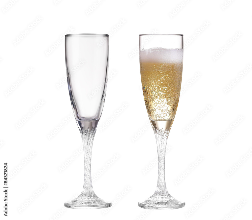 Full and empty champagne glasses with white wine Full and empty champagne glasses with white wine