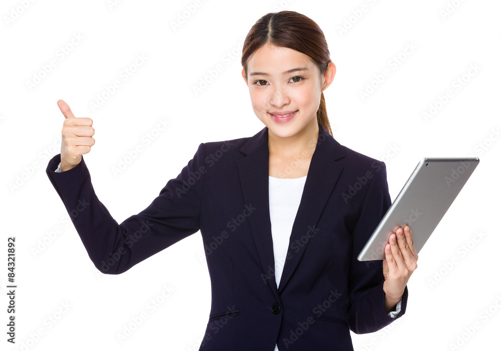 Asian businesswoman hold with tablet and thumb up Asian businesswoman hold with tablet and thumb up