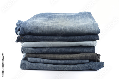 Stack of Jeans on White Background